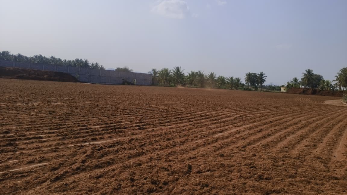 Aerial view of the open-air coir drying yard at the Dharmapuri facility